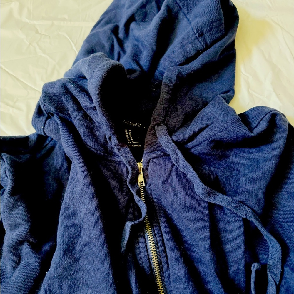 Cropped style navy blue zip up hoodie